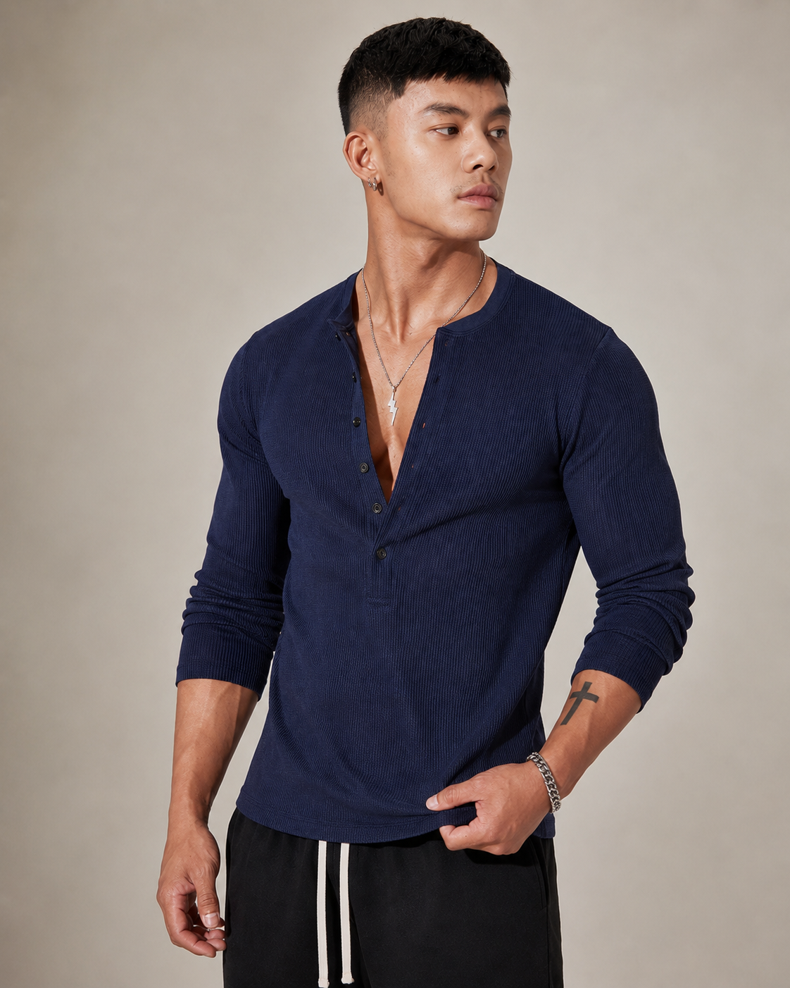 Pull en maille côtelée à manches longues et demi-boutonnage