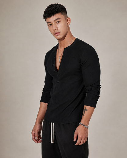 Pull en maille côtelée à manches longues et demi-boutonnage
