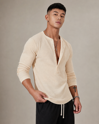 Pull en maille côtelée à manches longues et demi-boutonnage