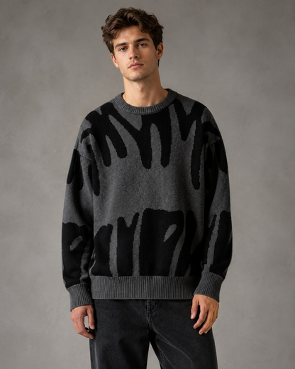 Maglione da uomo in maglia con motivo astratto e spalle scese