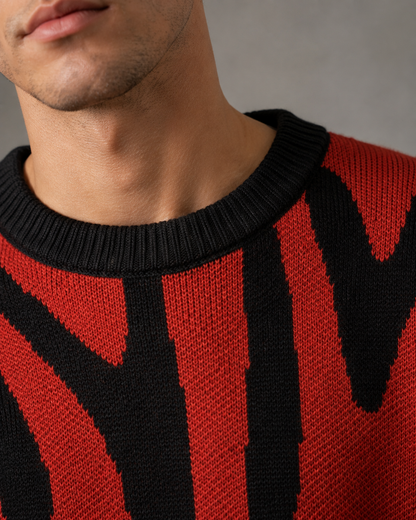 Maglione da uomo in maglia con motivo astratto e spalle scese