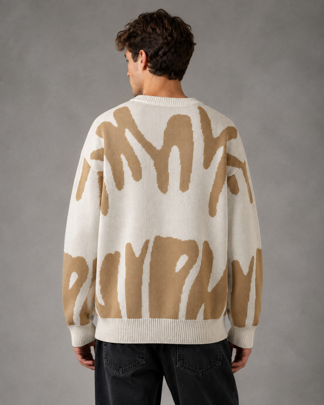 Maglione da uomo in maglia con motivo astratto e spalle scese
