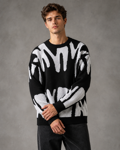 Maglione da uomo in maglia con motivo astratto e spalle scese
